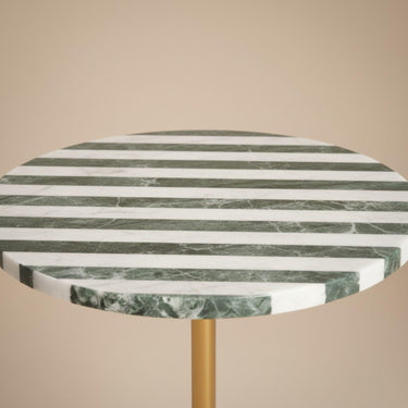 Close-up of striped marble top side table edge detail