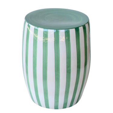 Angled view of the Green striped side table highlighting the solid green circular top and smooth rounded ceramic silhouette.