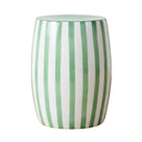 Green striped side table featuring a white ceramic base and bold vertical green stripes for a fresh, organic look