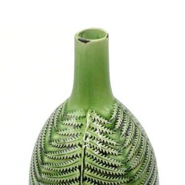 Modern green vase with glossy finish, perfect for holding fresh flowers or decorative items.