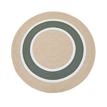 A round woven rug with concentric circular stripes in natural beige, dark green, and white, shown from a top-down view on a solid white background.