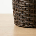 dark brown woven thick wicker base of the koko brown rattan side table.