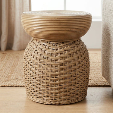 Koko Coiled Rattan Side Table in Tan, styled in a living room