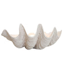Large white clam shell bowl with a realistic sculptural silhouette and detailed organic ridges for coastal decor.