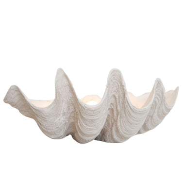 Large white clam shell bowl with a realistic sculptural silhouette and detailed organic ridges for coastal decor.