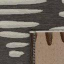 Earthy-toned  lookout outdoor rug with a subtle cross-hatch pattern.