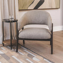 Lorenzo occasional chair placed in a living room, showcasing comfort and style