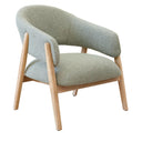 Modern armchair with green fabric and wooden legs.