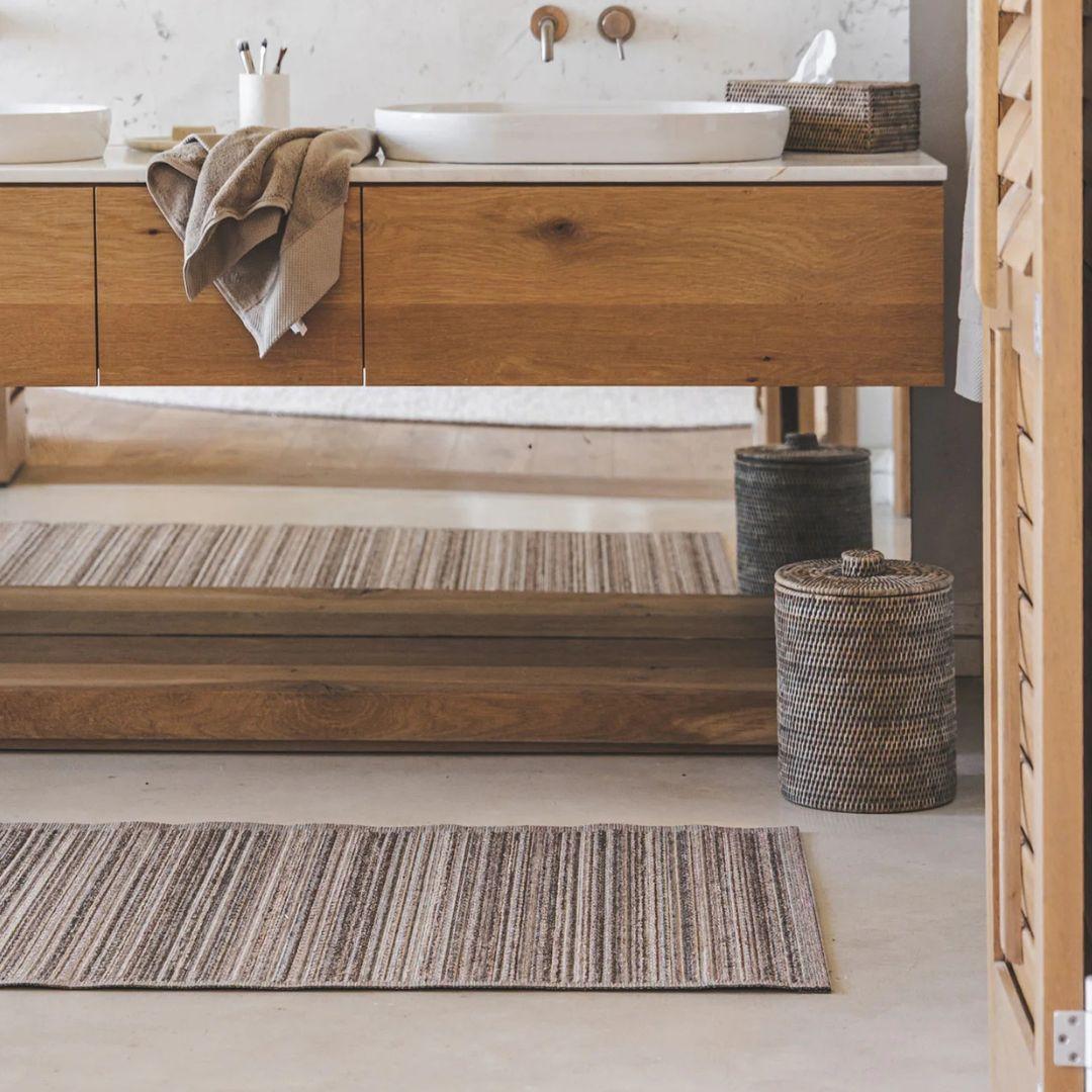 Lucian Outdoor Runner in Dune styled in a bathroom