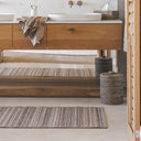 Lucian Outdoor Runner in Dune styled in a bathroom