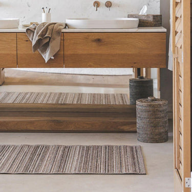 Lucian Outdoor Runner in Dune styled in a bathroom