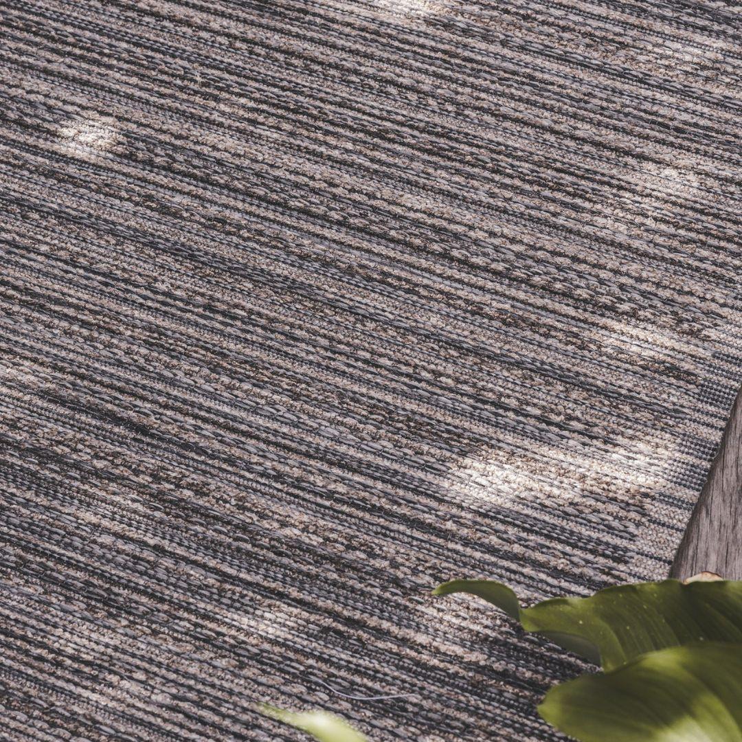 Lucian Outdoor Runner in Sea Moss styled on outdoor patio close up