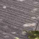 Lucian Outdoor Runner in Sea Moss styled on outdoor patio close up