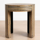 Luma round bamboo side table featuring a black and natural striped inlay design with curved slab-style legs.