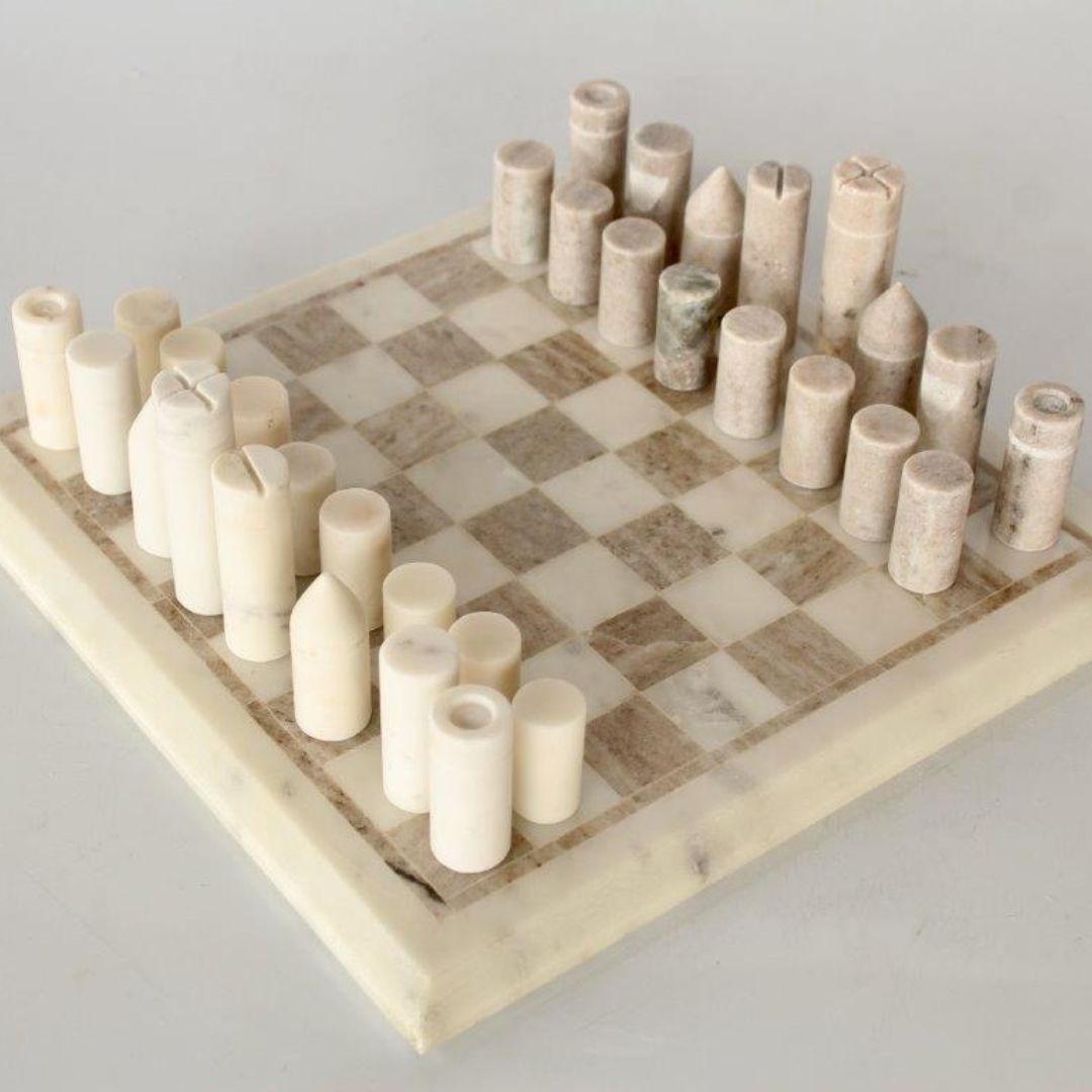 Shop the Marble Chess Set at Woodka Interiors, featuring elegant marble pieces that blend entertainment and sophistication, perfect for home or office decor.