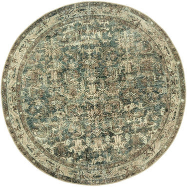 Large marquis round rug in a muted desaturated palette 