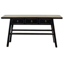 Black Maya console table with a sleek silhouette and three drawers accented by traditional brass ring pulls