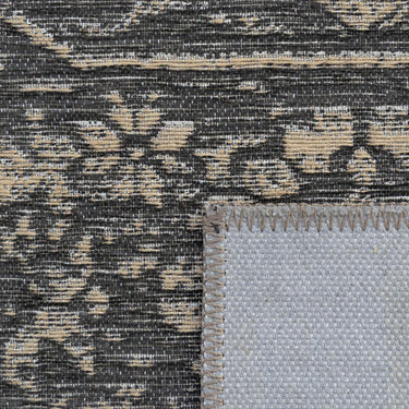 Memoir Rug in Ink Pen showing the intricate Persian-style weave and the textured blend of natural jute and soft recycled polyester fibers.