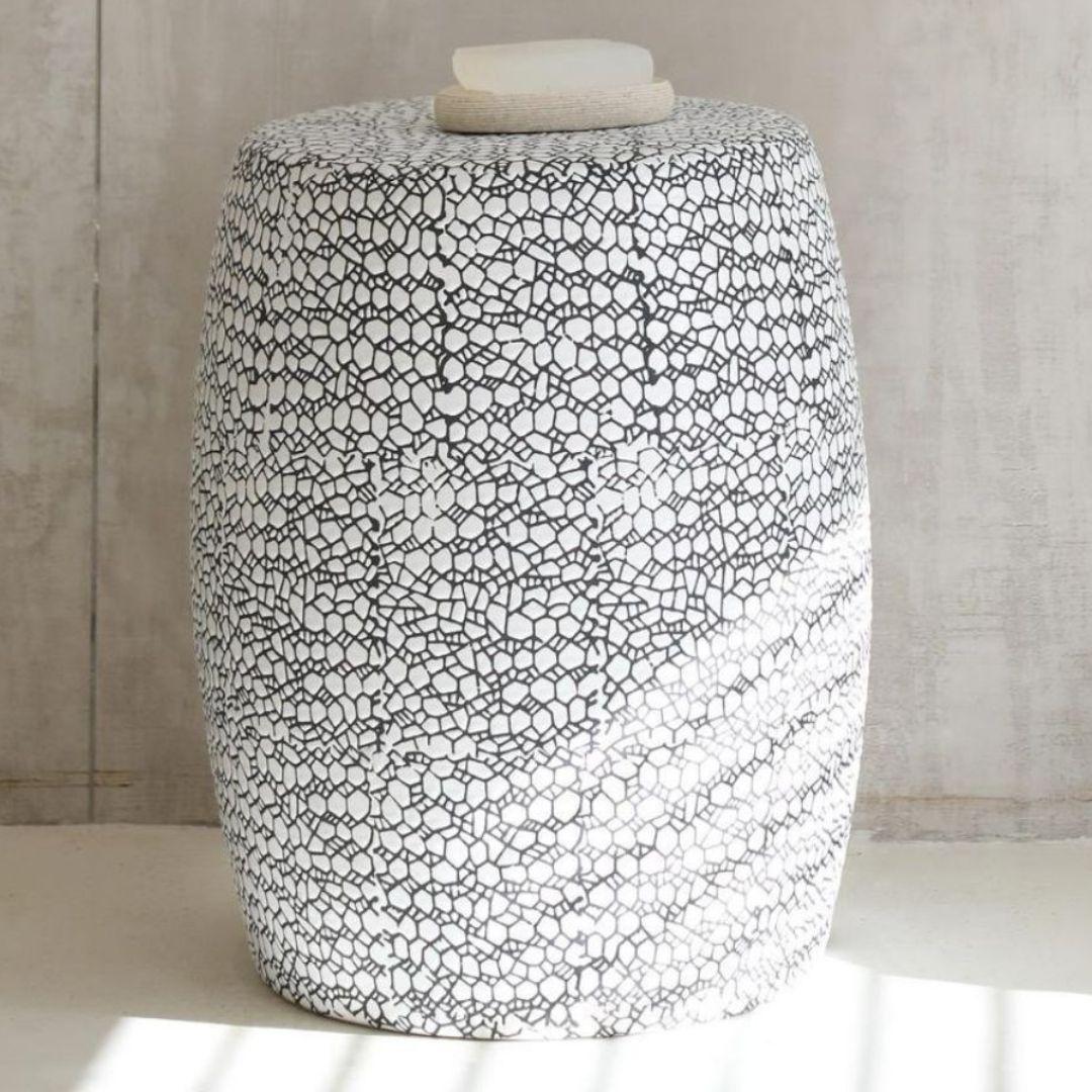 Monaco ceramic side table styled in a contemporary bathroom beside the shower.