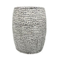 Monaco ceramic side table featuring a bold black and white pattern.