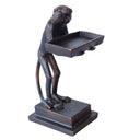 Monkey-shaped business card holder for reception desks