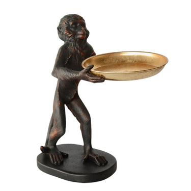 Monkey butler holding gold decorative tray