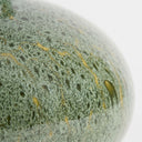 Mottled green ceramic vase details with a wide round shape and short flared neck, glazed in layered shades of green