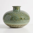 Mottled green ceramic vase.
