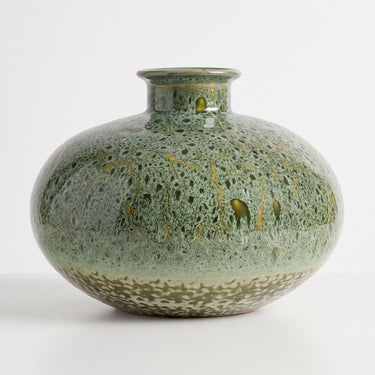 Mottled green ceramic vase.