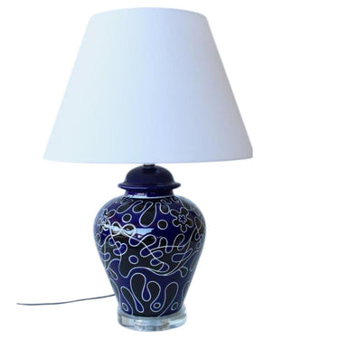 ceramic table lamp in navy blue splat motif, great for adding a welcoming ambiance to your entryway or hallway.