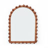 The Orla Arched Mirror, an arched decorative wall mirror with solid wood bobbin detailing