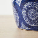 Blue and white ceramic stool base.
