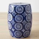 Porto blue and white ceramic stool with intricate medallion pattern.