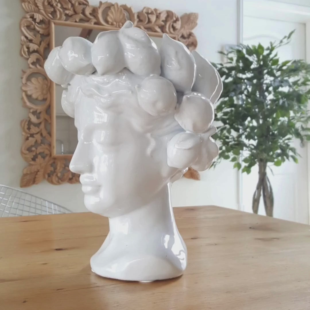 Ceramic head vase with a lemon wreath in white