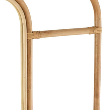 Close-up detail of the rattan cane bindings wrapped around the joints of mirror ladder frame.