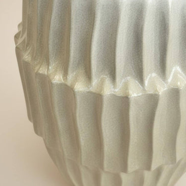 reeded side table close-up of faceted ridge detail