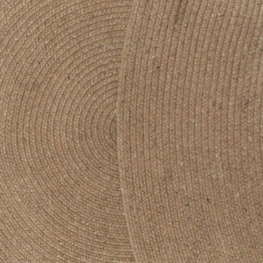 Close-up of a Carousel Round Outdoor Rug in maple