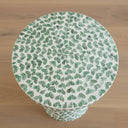 Round side table top with green shell leaf pattern