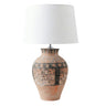 74cm table lamp featuring a rustic unglazed terracotta urn base with charcoal tribal motifs and an off white linen drum shade.
