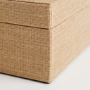 Raffia storage box in natural tone.