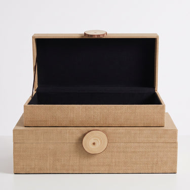 Raffia storage box set with wood knob lids in natural tone and protective black lining inner.