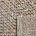Close-up of a sandbar outdoor weather-resistant rug showing the durable cross-hatch texture