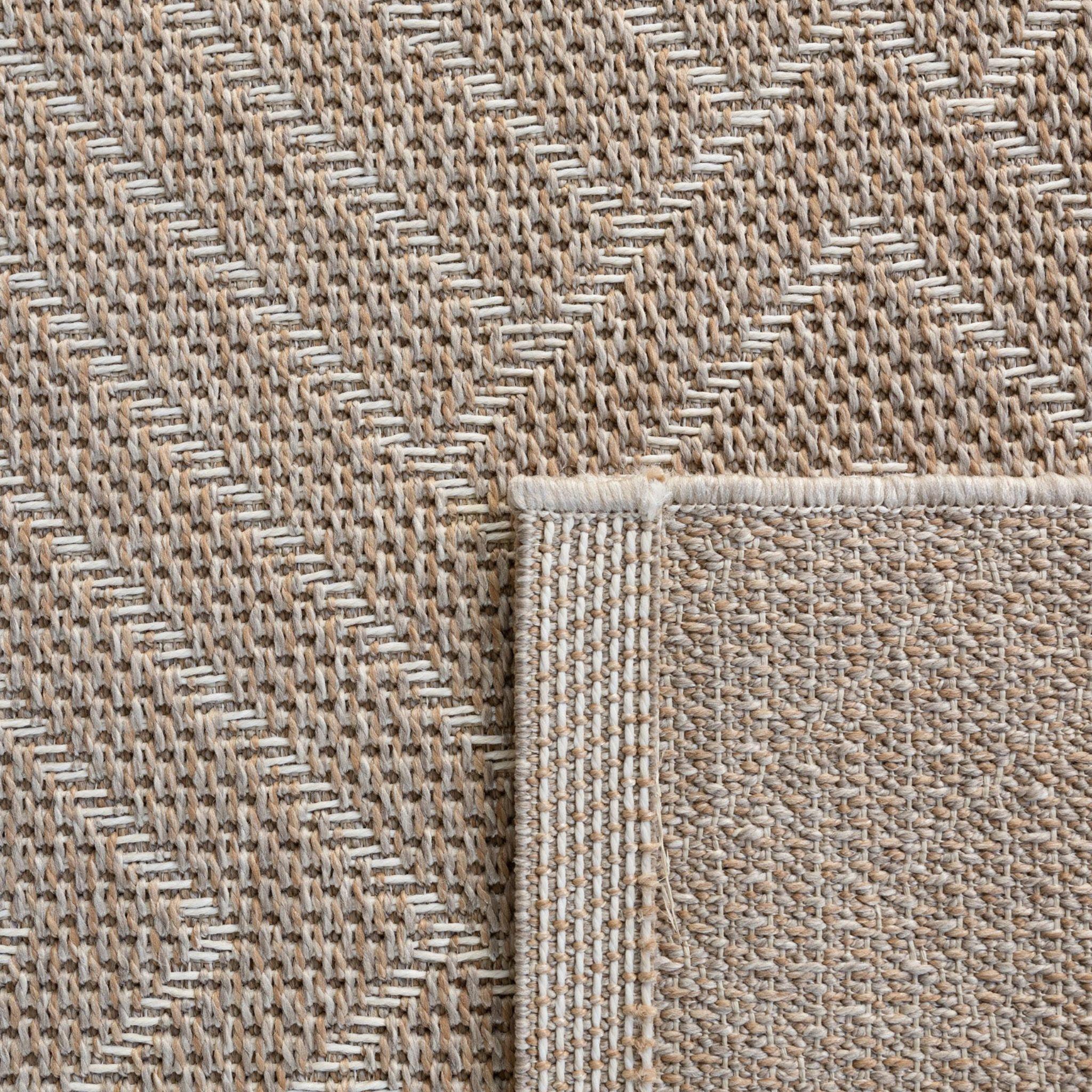 Close-up of a sandbar outdoor weather-resistant rug showing the durable cross-hatch texture