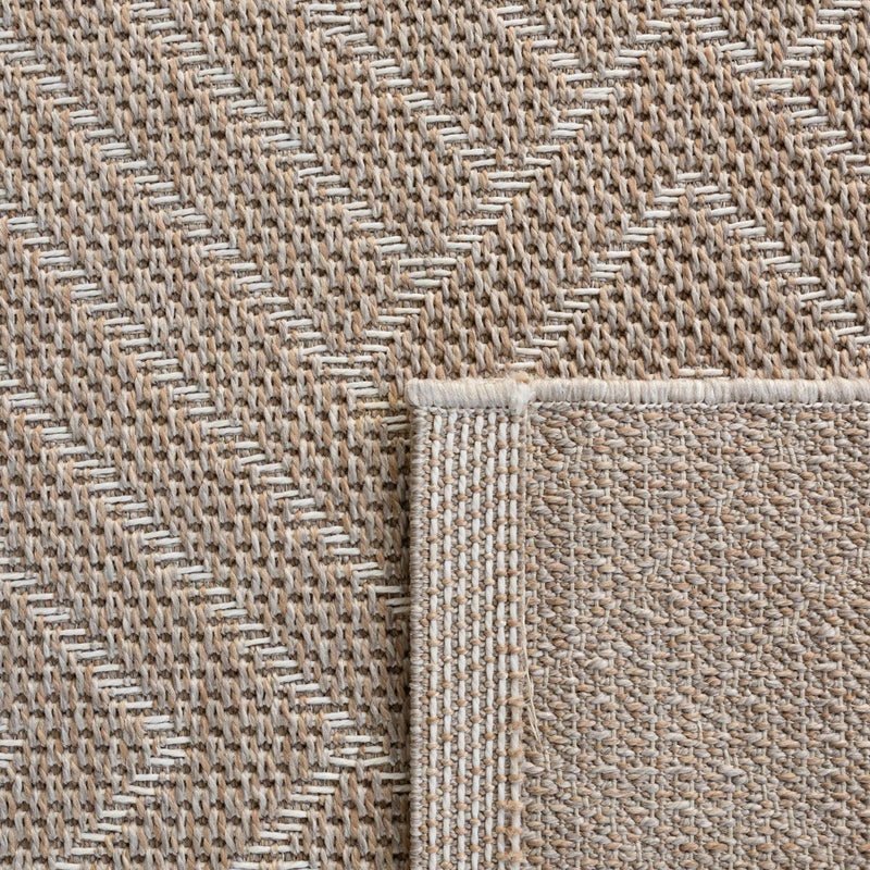 Close-up of a sandbar outdoor weather-resistant rug showing the durable cross-hatch texture