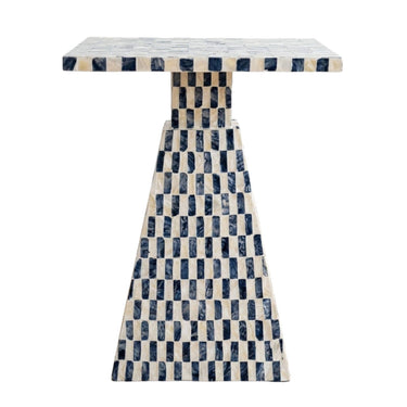 A modern pyramid side table with a geometric checkered pattern in pearl and dark blue mosaic capiz tiles, shown against a plain white background.