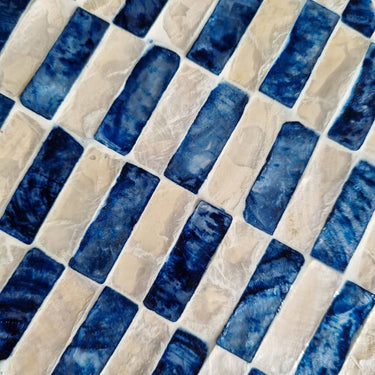 Blue and white rectangular mosaic capiz tiles arranged in a diagonal pattern 