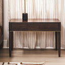 sienna wooden large nightstand or side table against a neutral curtain in bedroom