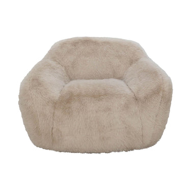 large cream faux fur occasional chair with a plush, oversized silhouette.