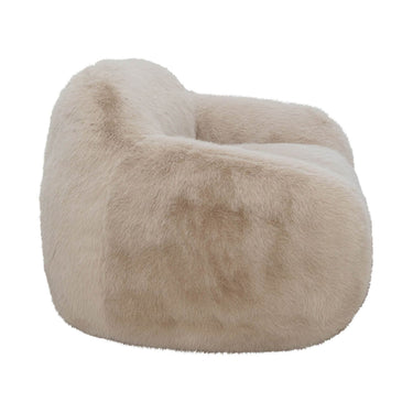 Snuggles cream lounge chair showing the thick, cloud-soft faux fur upholstery.