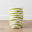 Ceramic Stool styled as a vibrant ceramic accent table from Woodka Interiors